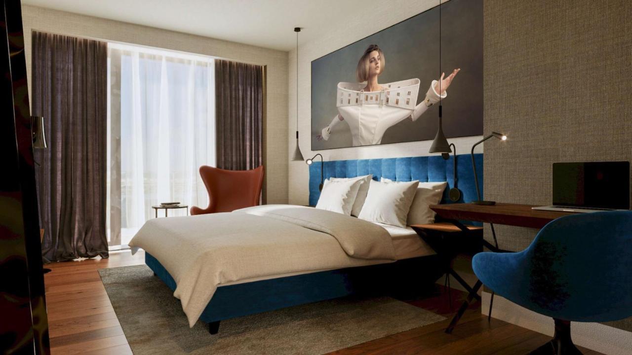 Radisson Blu Aurum Hotel, Брашов Екстериор снимка A bedroom at the hotel